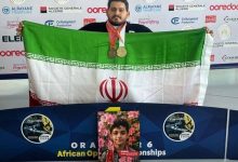 ایزدی مدال‌های طلا و برنز خود را به شهید ماکان نصیری اهدا کرد