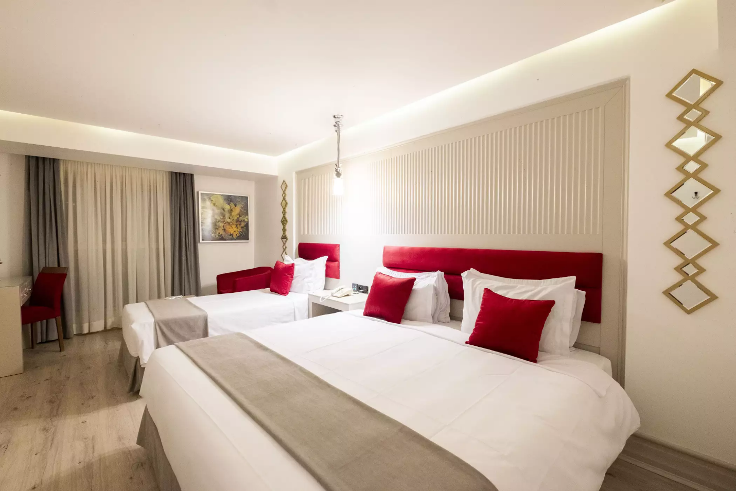 A room with two bedsAI-generated content may be incorrect.